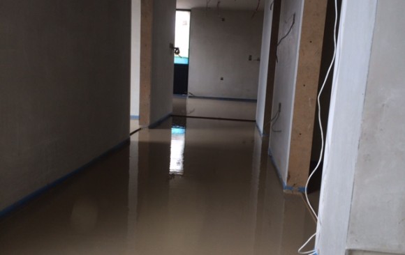 180m2 self levelling flowing floor screed_new build_new floor in Derry by B Doherty Screeding Services with FP McCann